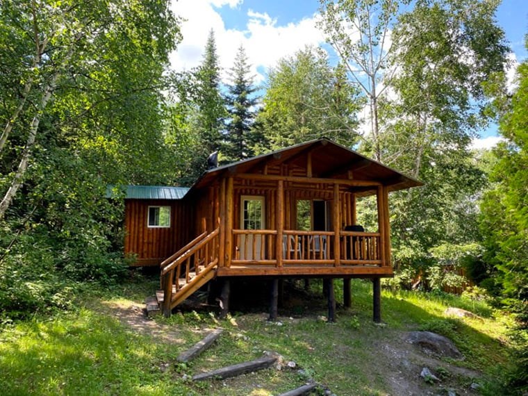 beautiful-log-cabin-exterior-with-deck
