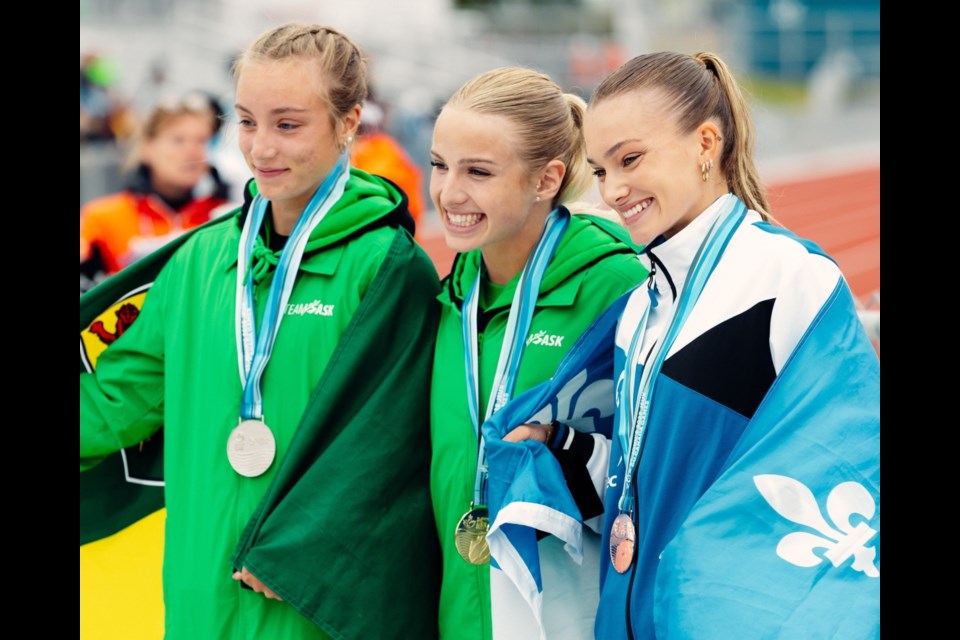 Langham’s Tayen Werner (middle) finished one-two alongside Dilke’s Hailee Woodhouse in the women's 400 metres.