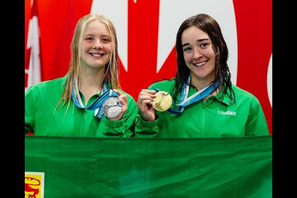 Regina's Lil Stewart (right) won gold and Isa Koop claimed silver in women's artistic diving.