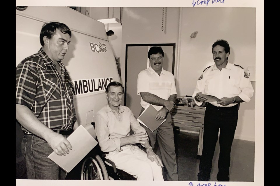 Alex Wicklund made a special trip to be present when the two friends saved his life. Harold Lipsey (left) and Gary Kerns were awarded Good Samaritan certificates by the BC Ambulance Service. 