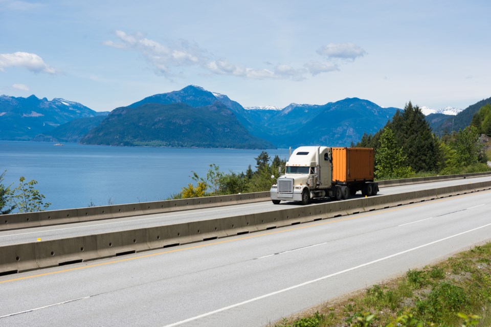 A transport truck hauling goods along the Sea to Sky Highway. 