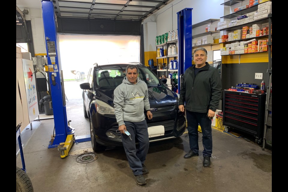 Mohammadali Shahri (right) and Hossein Mohammadi at the shop in Brackendale on Dec. 2. 