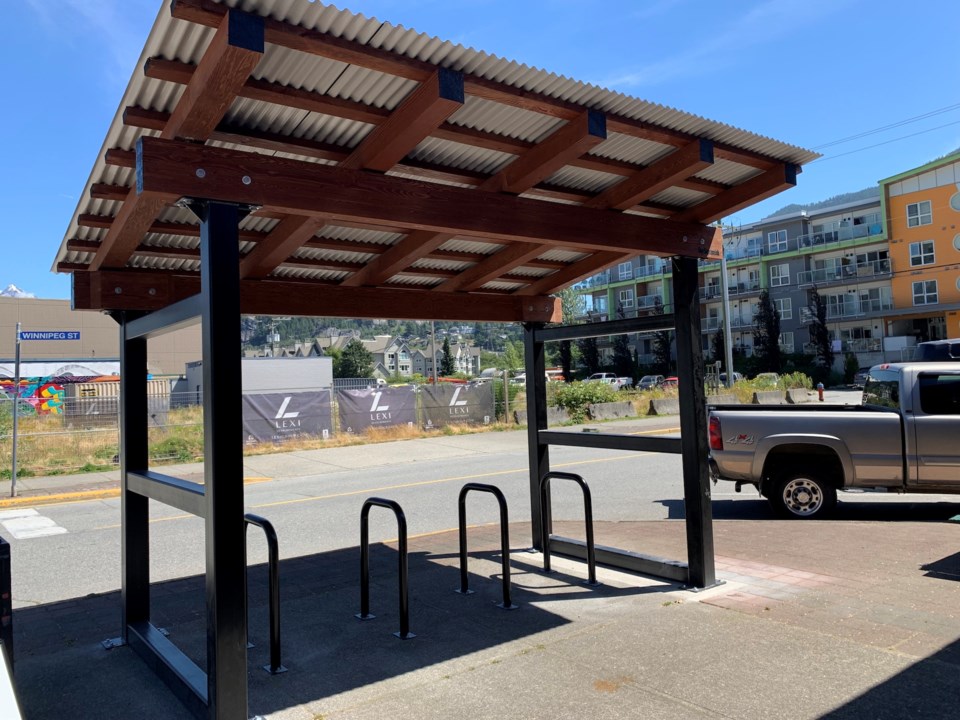 Covered bike outlet shelter