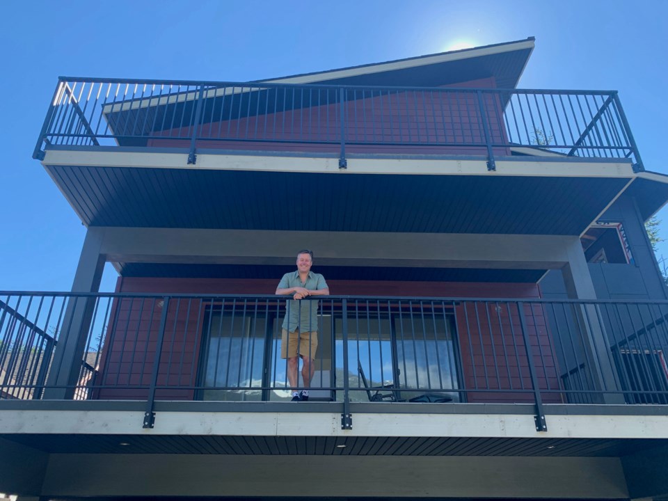 Dave Ransier on the deck of his Responsible Living home. 