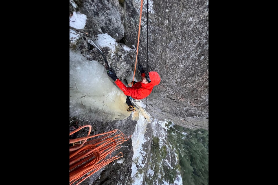 Niall Hamill reaching the belay on the crux pitch of "Jungle Warfare" M6 wi5. 