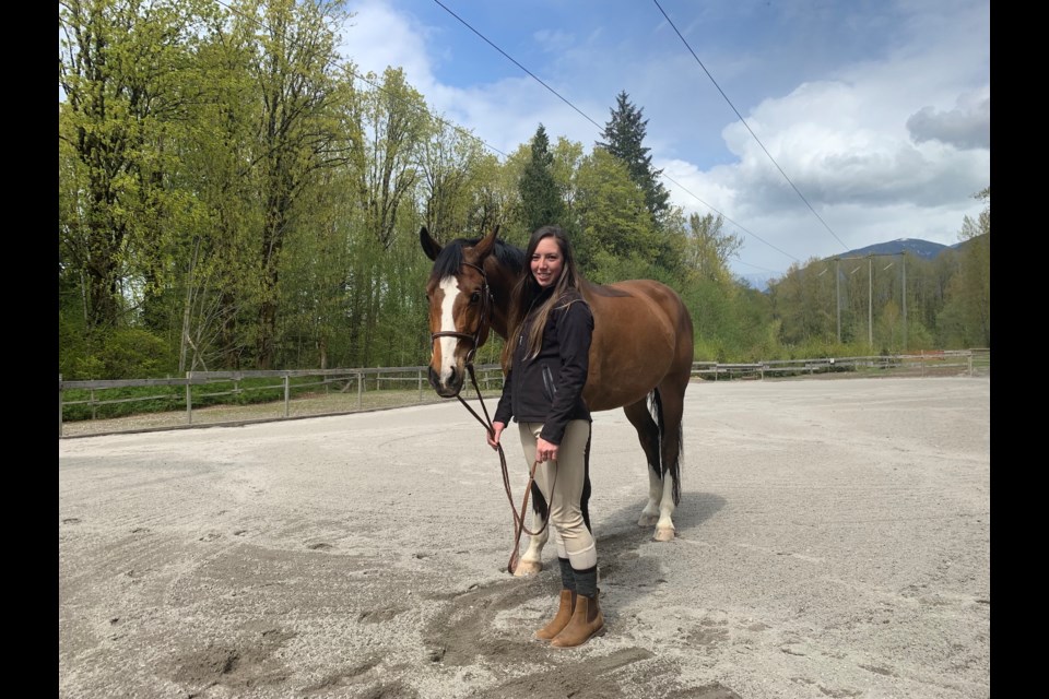 Jordan Wong, president of the non-profit Squamish Valley Equestrian Association (SVEA), with her horse, Kenny. 
