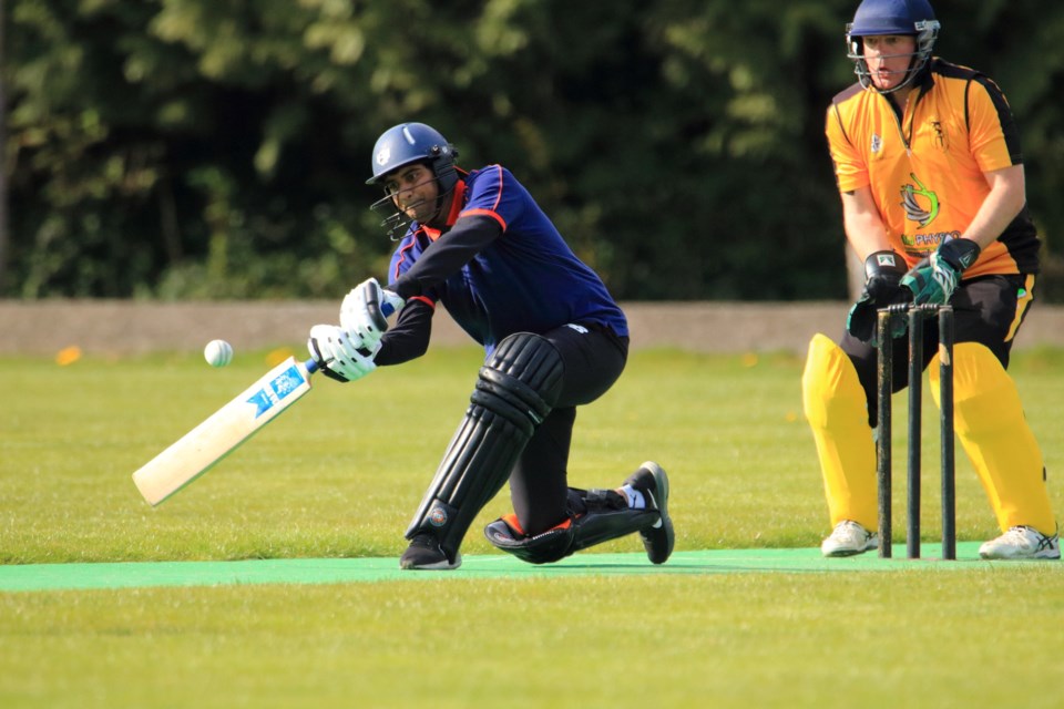 In action are batsman Koushik Sridhar of the Squamish Cricket Club and wicket-keeper Richie Middleton of West Vancouver Cricket Club.
Sridhar dismisses the ball to the boundary for four.
