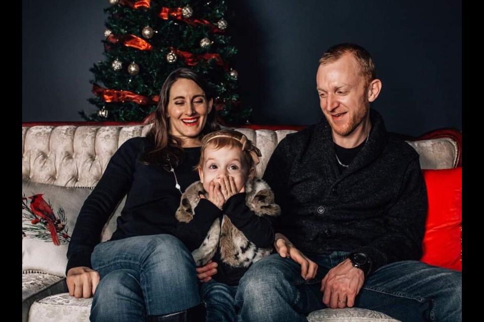 Kristen McBride, her husband  Brandon Loree and their daughter Rylee.