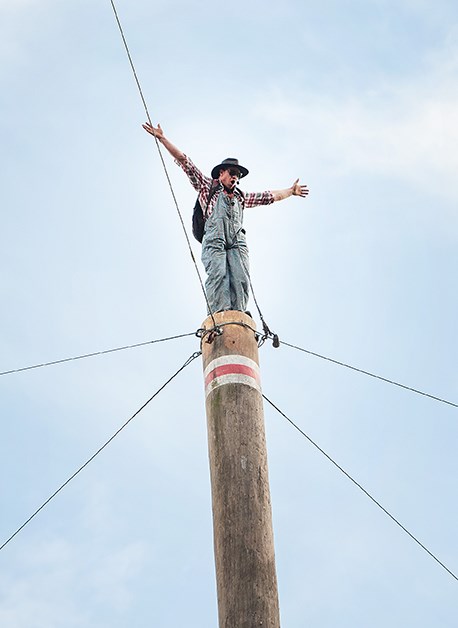 Stirling Hart as ‘Rambling Jess Elliott’ in the famed loggers days tree routine. 