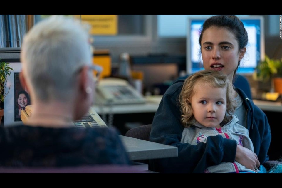 Squamish actor Amy Reid in 'Maid' the Netflix series. A fun fact is that Reid's own daughter is in the picture on the desk in the scene. 
