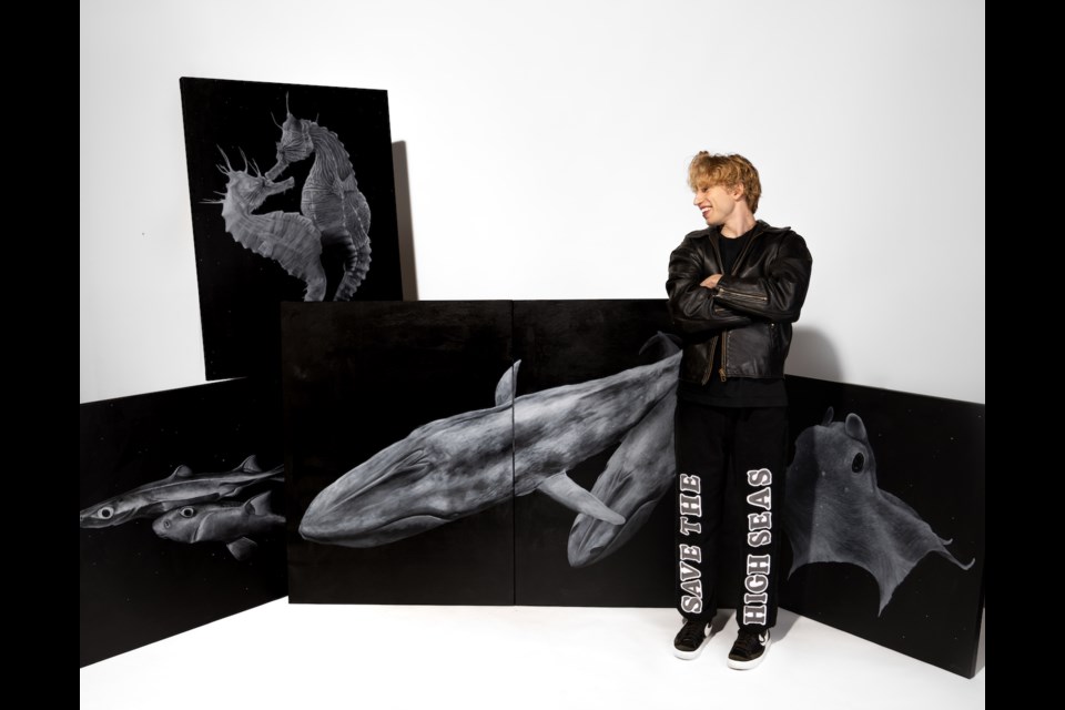 Mathias Horne with his artwork. 