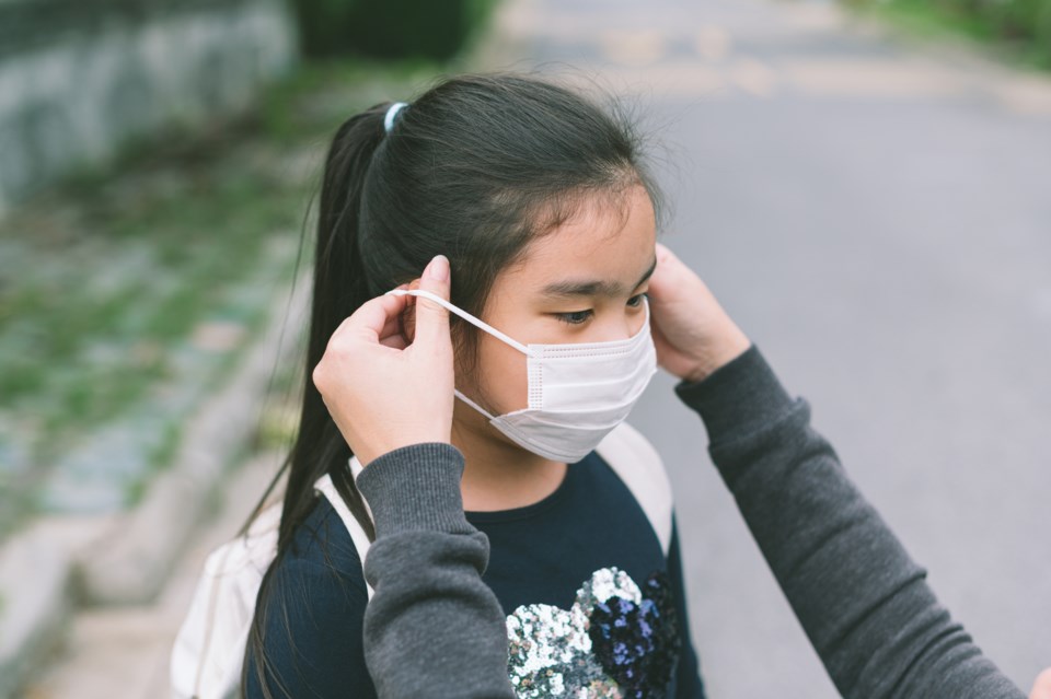 mom puts on mask/Squamish