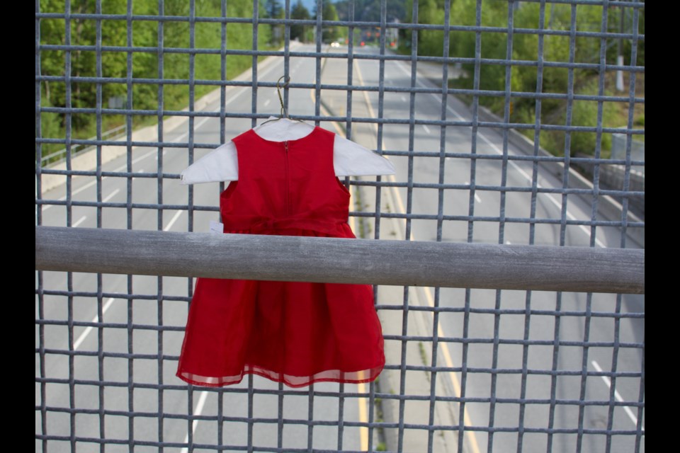 A dress hangs on the overpass by Totem Hall to honour National Day of Awareness for Missing and Murdered Indigenous Women and Girls Day, May 5.