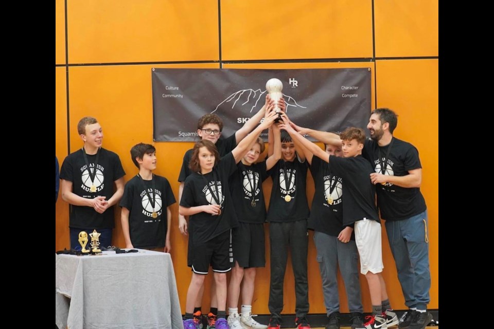 The Sky League celebrated the end of its first championships recently. Here, the Squamish Nets, led by coach Yoni Marmorstein and coach Dimitri Kozang, are all smiles after taking home the championship in the league's older division.
