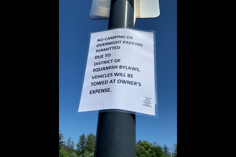One of the signs that appeared in late July in the Walmart parking lot. 