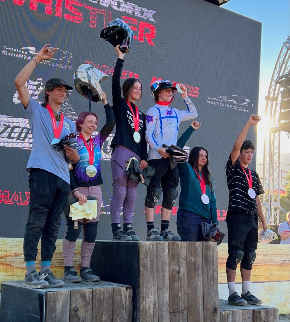 VIBESJack MacLeod (far left) takes his place on the podium.