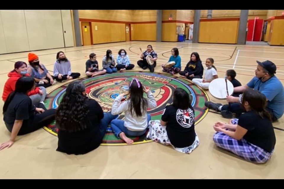 The Welhtima Kexwusem song and dance group at Totem Hall. 