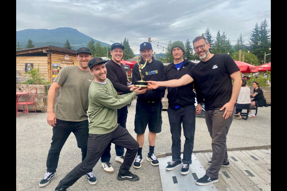 The winning crew in Ƶappon Friday night, with their Emmy.
