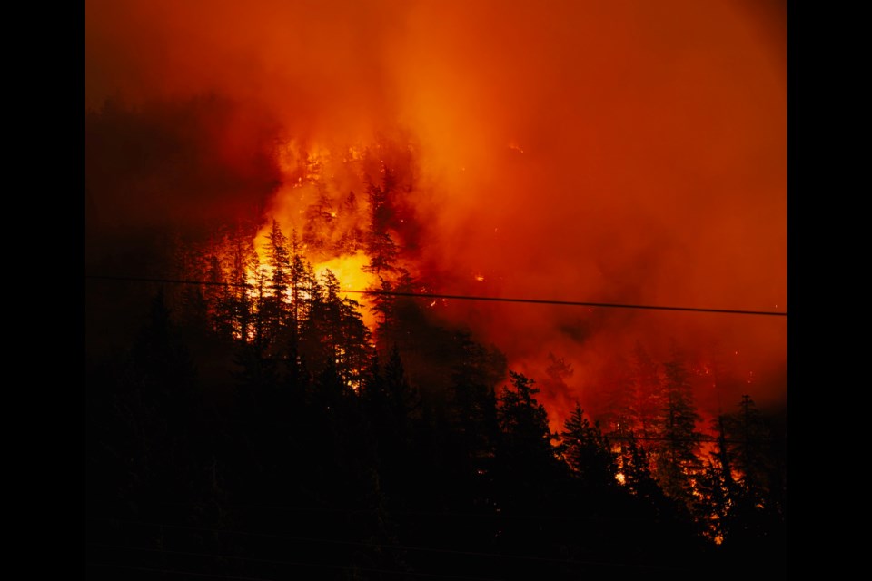 Flames from the Dryden Creek fire burn through forested hillsides near Squamish, British Columbia, on Monday night, June 9, 2025. The District of Squamish has issued an evacuation alert for nearby residents as the wildfire continues to grow under extreme fire danger conditions. 
More than 200 wildfires burning across British Columbia and over 800 active fires reported nationwide.