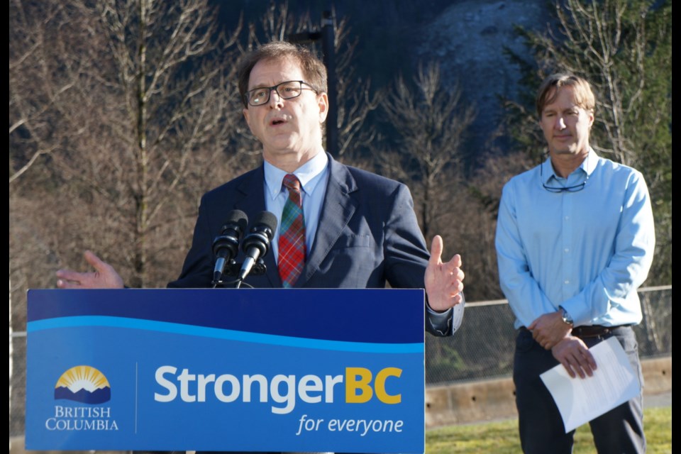 Minister of Health Adrian Dix announced Monday afternoon behind Squamish General Hospital that the district is getting a  Computed Tomography (CT) scanner at the hospital. 
Dr. Stephen Masselink, VCH medical director for Squamish looks on behind Dix.                  