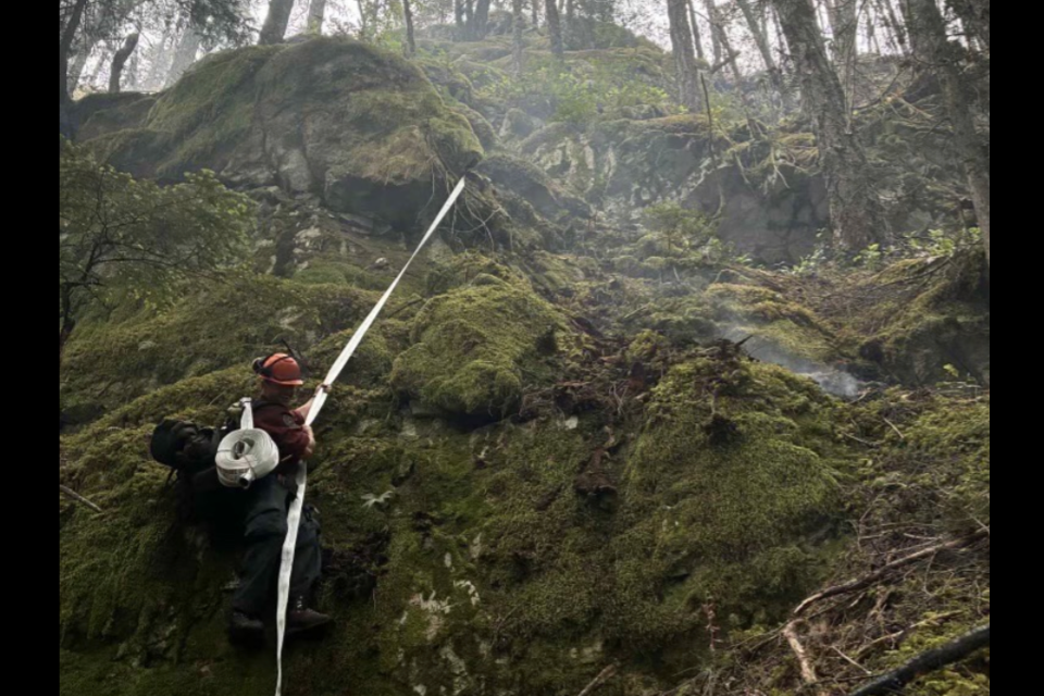 Firefighter working the Dryden Creek fire on June 15.
