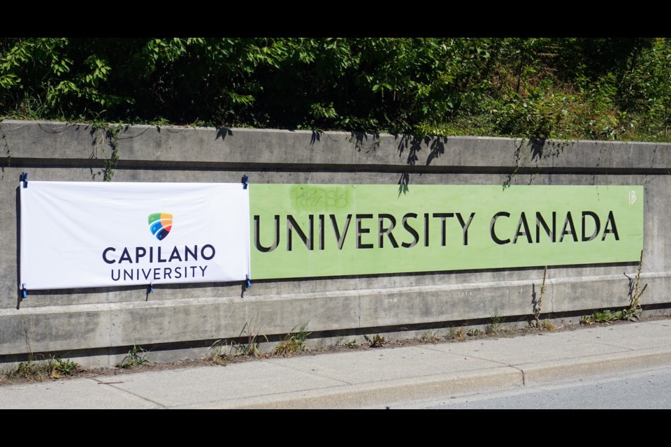Quest University signs were covered on Wednesday morning by new Capilano University signage, as the North Van school announces its purchase of the former private school's campus. 