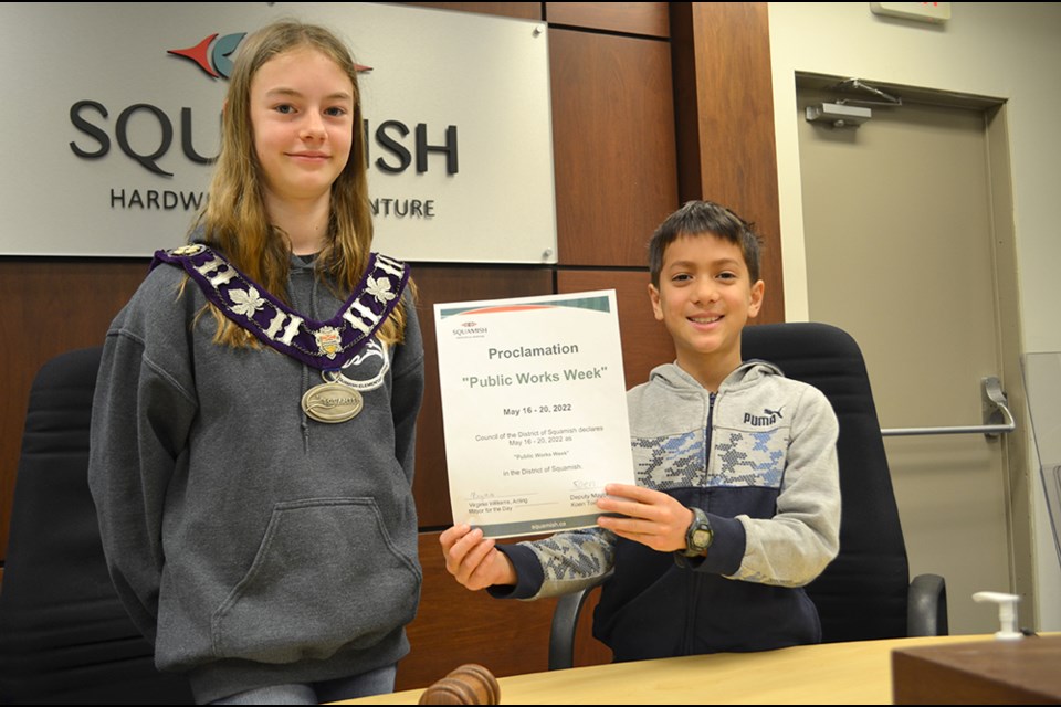 As their first act, the mayor and deputy mayor for the day signed a proclamation declaring May 16 to 20 as Public Works Week.