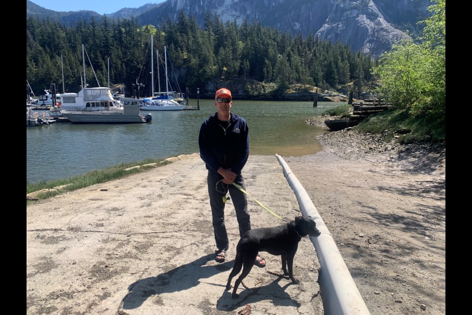 Trevor Chelswick, standing on the boat launch May 1.