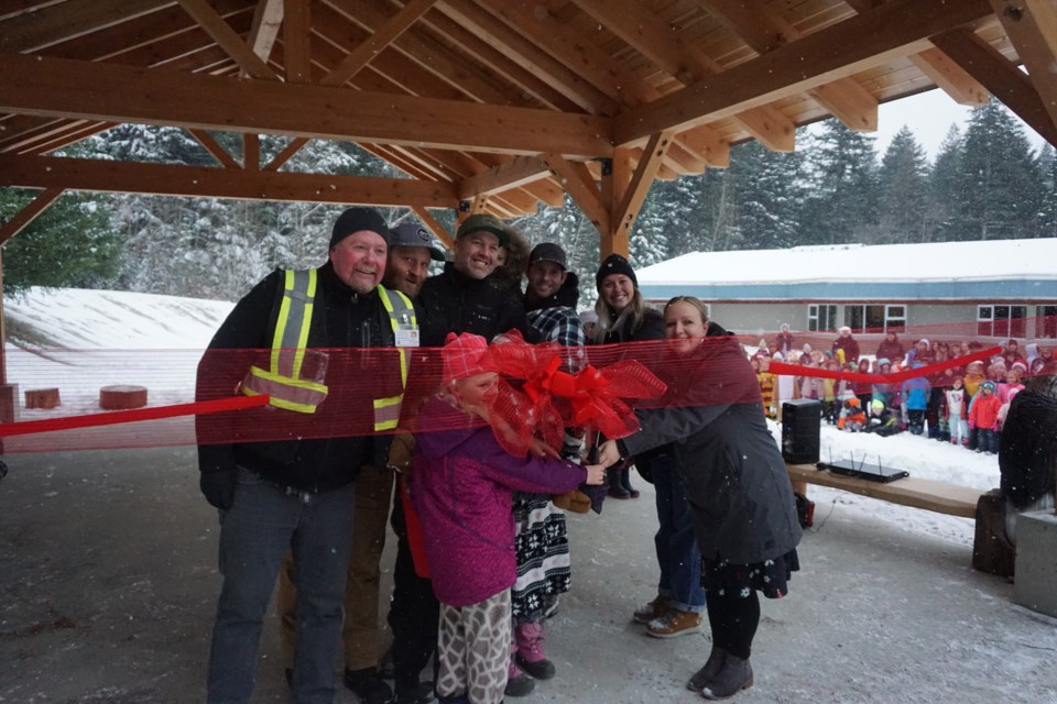 The outdoor classroom gets unveiled in a ribbon cutting ceremony.