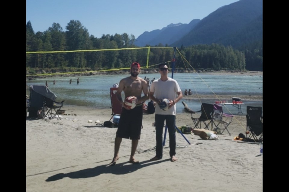 Amiro Harati (left), of Burnaby, and his friend in Squamish near the river on the day he got caught in the current.