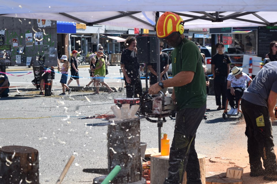 That brum-brum-brum-brum sound downtown right now is the sound of chainsaws making chairs at the Squamish Days Loggers Sports Chair Carve on downtown.
