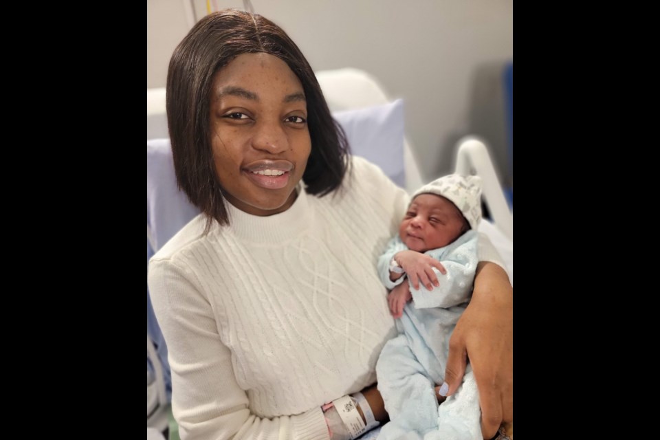 Sodetou Ayanajemi with her baby boy Ayan, who was the first baby of the year born in the Vancouver Coastal Health region.