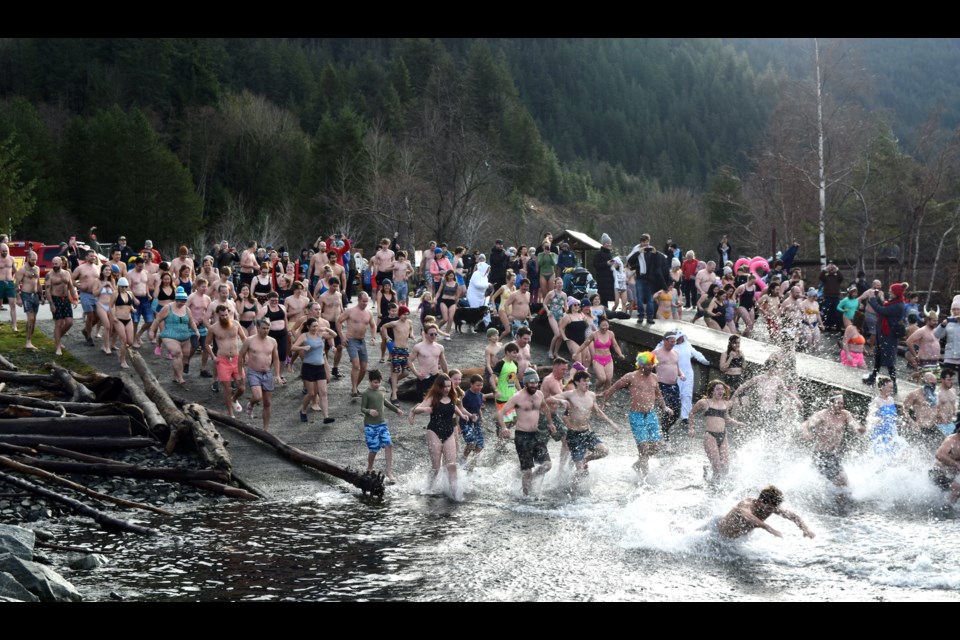 About 80 braved the cool waters of Howe Sound to ring in 2024 at Porteau Provincial Park at noon on Jan. 1. 