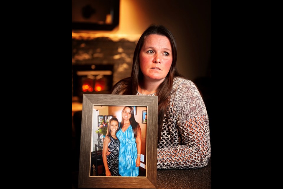  Brenda Doherty with a photo of her daughter, Steffanie Lawrence.