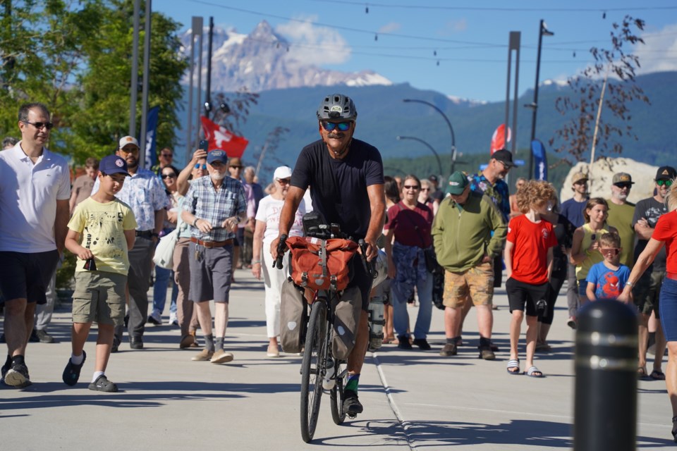  Local bike rider Daniel Gloor. as he was welcomed by loved ones and friends on Saturday evening.                             