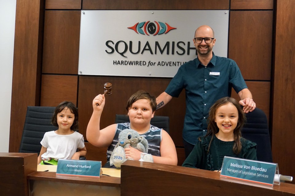 Parker Taylor and Bella Romero joined Mayor Armand Hurford, Coun. Andrew Hamilton and other District of ߣstaff at Municipal Hall as the winners of the annual “Mayor For A Day” contest.
