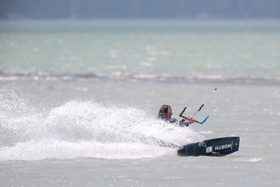 Kiteboarders take advantage of the windy day on July 5. Check with the Squamish Windsports Society for how to access Howe Sound from town. 
