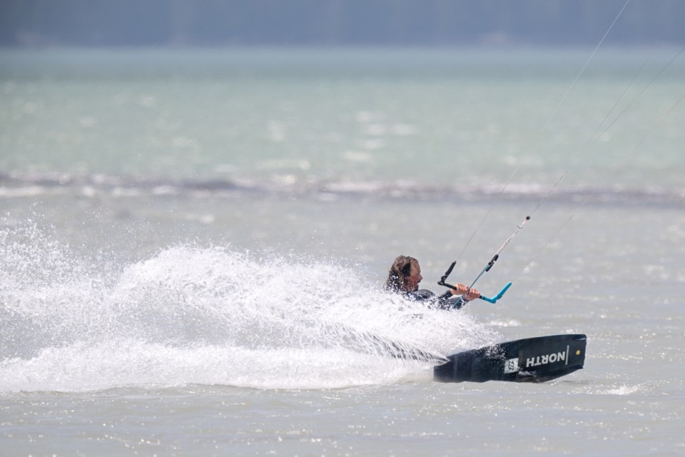 Kiteboarders take advantage of the windy day on July 5. Check with the ƵappWindsports Society for how to access Howe Sound from town. 