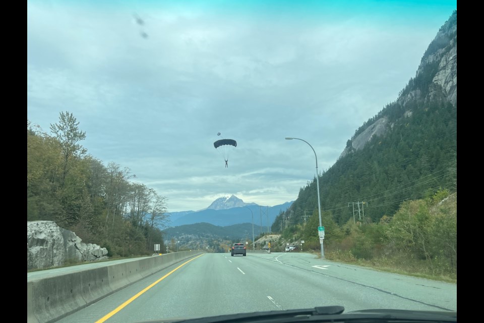 Tom Maliszewski, who said he is from 
Detroit and Squamish, captured this image of a BASE jumper over Highway 99 while driving into Squamish a few weeks ago. 