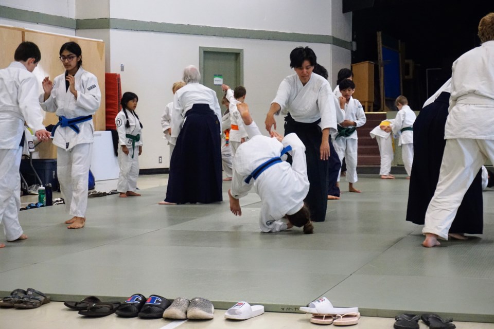Grant Babin, chief instructor of Aikidaily International Academy in Squamish, teaches a mixed-age class at Brennan Park Recreation Centre on Saturday, Aug. 12. There were about 25 youth and 40 participants in total.