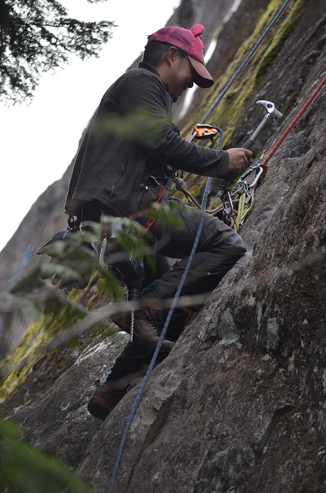 Eric Tran climbing