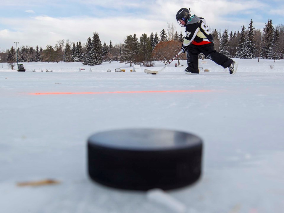 0212 HockeyCovid pond hockey CC 9530