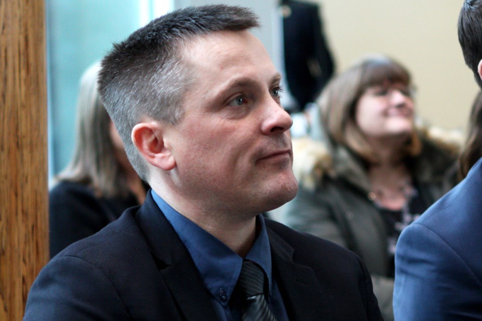 Nate Horner, MLA for Drumheller-Stettler, listens to an announcement inside of the Edmonton Federal Building on Thursday, Feb. 6, 2020. CLAIRE THEOBALD/Photo