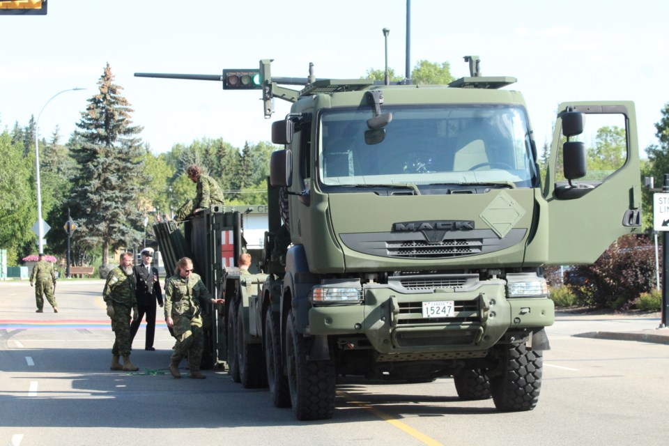 A Special Equipment Vehicle provides a pop-up shelter the unit uses as walk-in medical clinic. JACK FARRELL/St. Albert Gazette