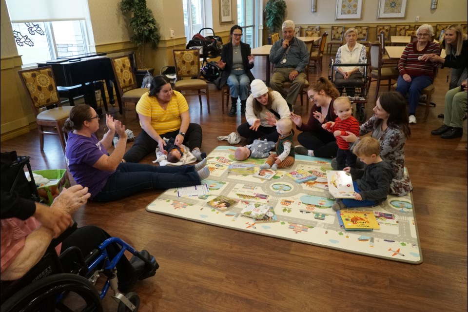 Moms, babies and seniors connect at the St. Albert Public Library's Baby Storytime event. RILEY TJOSVOLD/St. Albert Gazette 