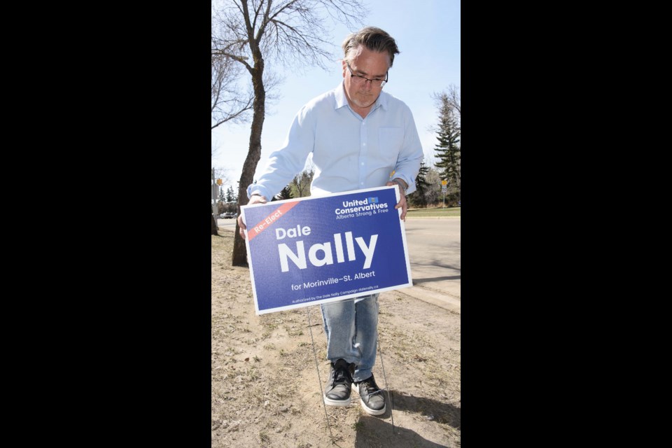 ELECTION SIGNS — Morinville-St. Albert UCP candidate Dale Nally was out planting election signs near École Marie Poburan on May 1, 2023. Election signs sprouted up across St. Albert within hours of the start of the provincial election that day. KEVIN MA/St. Albert Gazette