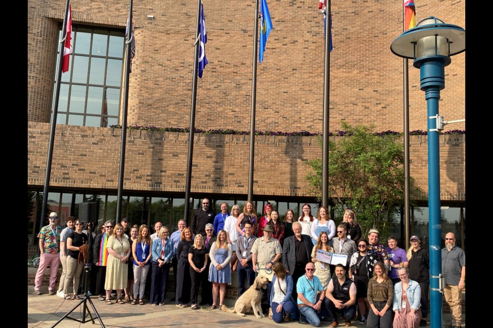 City staff, councillors, St. Albert Mayor Cathy Heron, and PFLAG St. Albert members and Pride in the Park organizers raised the Pride flag outside St. Albert Place the morning of June 5.