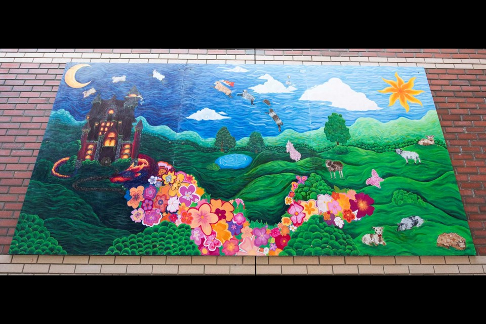 DREAMSCAPE — Bellerose and Muriel Martin students unveiled this two-part mural at the Sturgeon Community Hospital on May 29, 2024. This part of the mural depicts flying sheep in a fantasy landscape. KEVIN MA/St. Albert Gazette