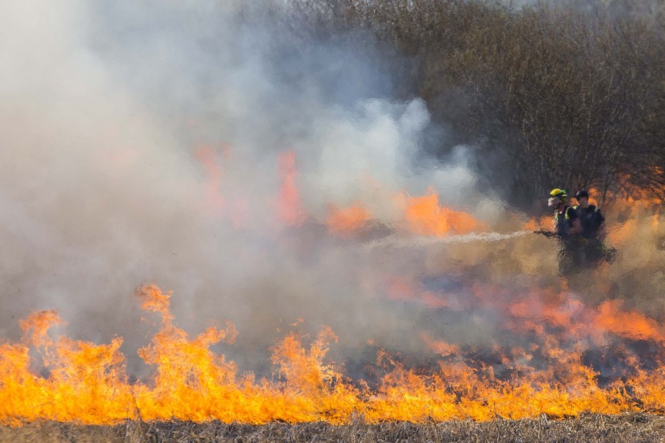 HOT TIMES — Massive wildfires in Alberta have blanketed much of the province with smoke. Shown here is a wildfire at Big Lake in 2016. CHRIS COLBOURNE/St. Albert Gazette