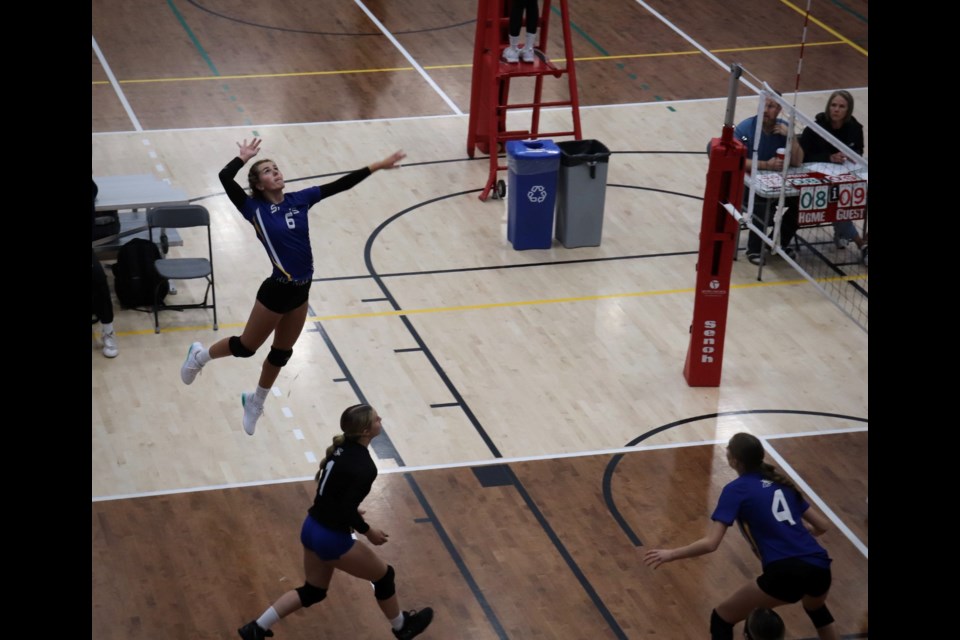 SACHS senior girls volleyball captain Makenna Diprose leaps into the air at a game against Jasper Place. SUPPLIED/Neala MacDonald